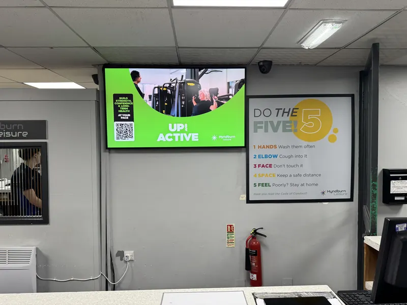 Screen above the reception counter at a Hyndburn Leisure centre